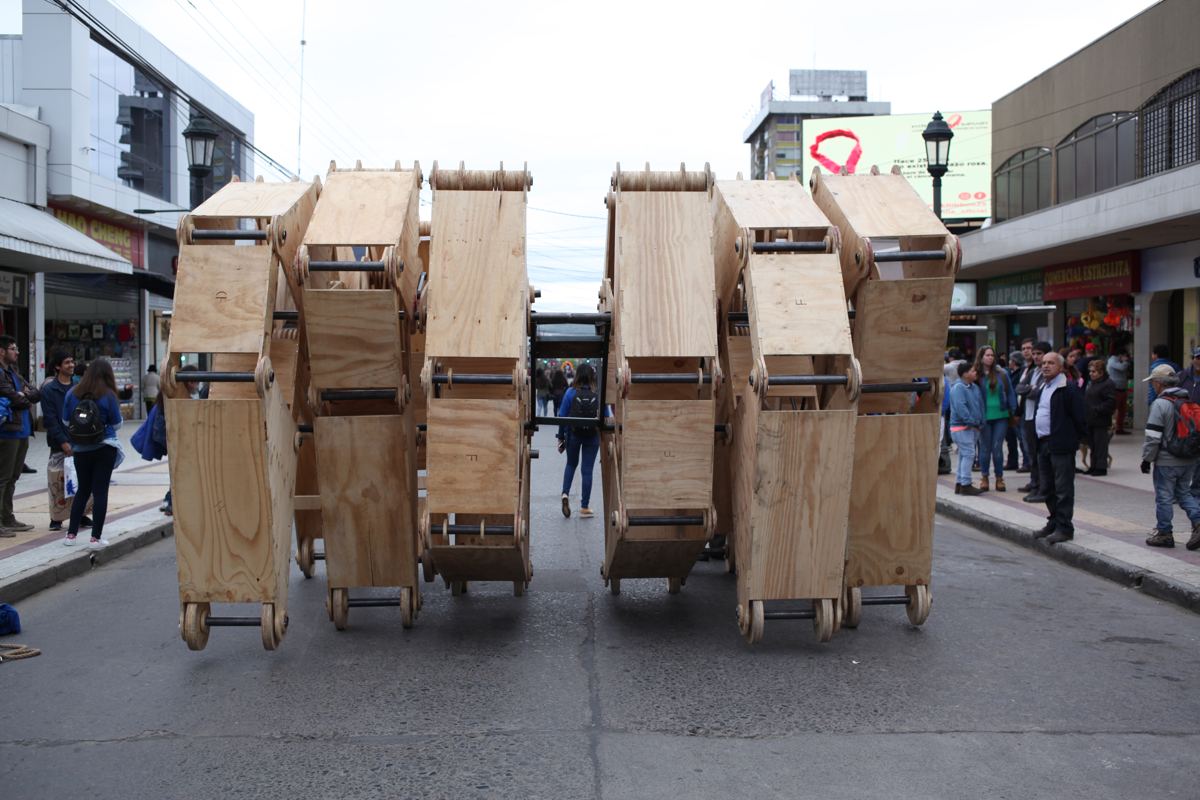 Animaris Talquinus, a wooden walking structure, on a street in Talca